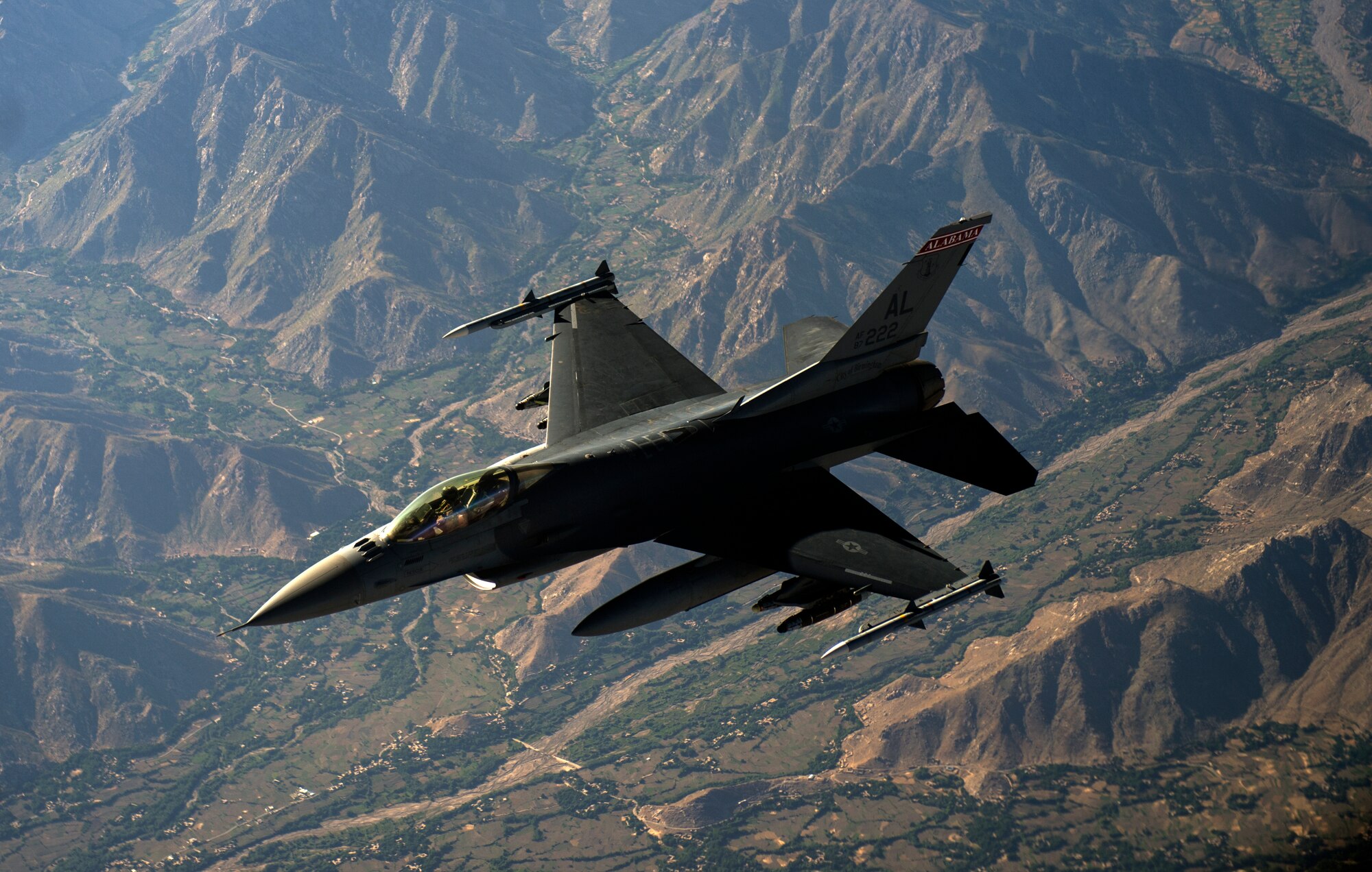 An F-16C Fighting Falcon flies over Afghanistan after an in-air refueling mission in support of Operation Enduring Freedom, July 22, 2014. The F-16 Fighting Falcon is a compact, multi-role fighter aircraft. It is highly maneuverable and has proven itself in air-to-air combat and air-to-surface attack. It provides a high-performance weapon system for the United States and allied nations. (U.S. Air Force photo by Staff Sgt. Vernon Young Jr./Released