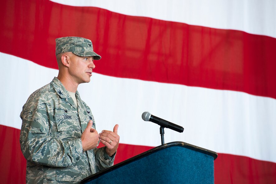 U.S. Air Force Col. Joseph Locke, 93d Air Ground Operations Wing commander, speaks during a change of command ceremony at Moody Air Force Base, Ga., July 23, 2014. Locke took command after serving as vice commander for more than a year. (U.S. Air Force photo by Airman 1st Class Ryan Callaghan/Released)