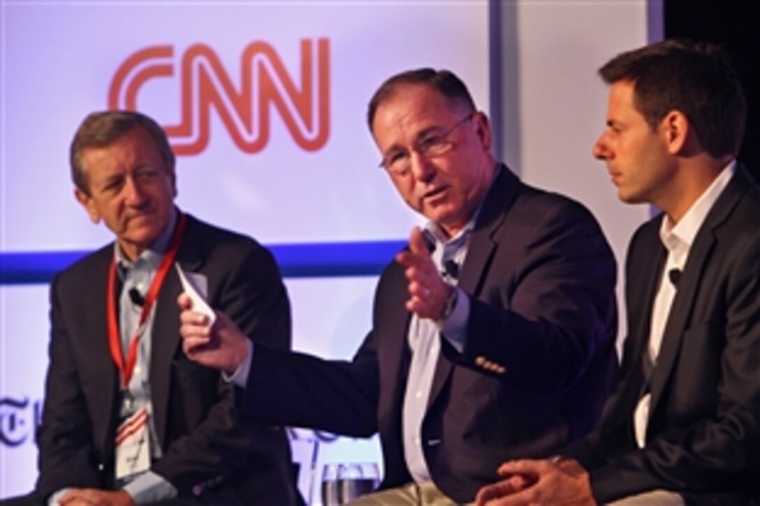 Undersecretary of Defense for Intelligence Michael Vickers, center, participates in a panel on the U.S. counterterrorism strategy at the Aspen Security Forum in Aspen, Colo., July 24, 2014. ABC News' Brian Ross, left, moderated, and John Carlin, assistant attorney general for national security at the Justice Department also participated. 