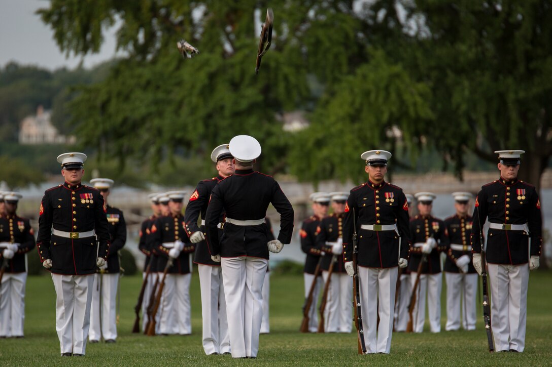 The United States Marine Silent Drill Platoon performs during a parade at Worden Field at the United States Naval Academy in Annapolis, Md., July 24. (Official Marine Corps photo by Cpl. Larry Babilya/Released)