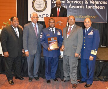 Senior Master Sgt. Torry Thompson of the Nevada Air National Guard receives the Roy Wilkins Renown Service Award at the 2014 National Association for the Advancement of Colored People (NAACP) 39th Annual Armed Services and Veterans Affairs Awards Luncheon, Las Vegas, July 22, 2014.
