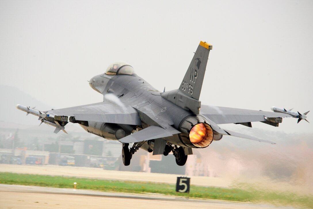 An F-16 Fighting Falcon takes off July 16, 2014, during exercise Beverly Midnight 14-2 at Kunsan Air Base, South Korea. The operational readiness exercise assesses mission capabilities and ensures Airmen are in a constant state of readiness. (U.S. Air Force photo/Senior Airman Taylor Curry)

