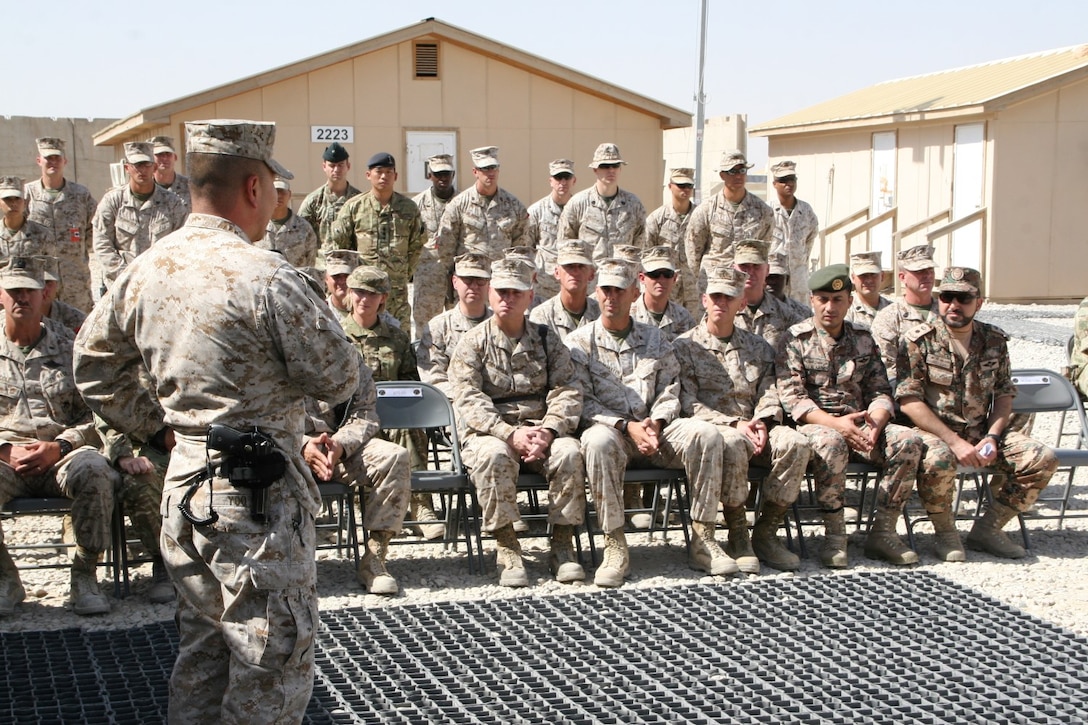 Brig. Gen. Daniel D. Yoo, commander, Regional Command (Southwest), addresses service members during the Jordanian flag-lowering ceremony aboard Camp Leatherneck, Helmand province, Afghanistan, July 23, 2014. The ceremony marked the end of mission for the Kingdom of Jordan's army serving with RC(SW).