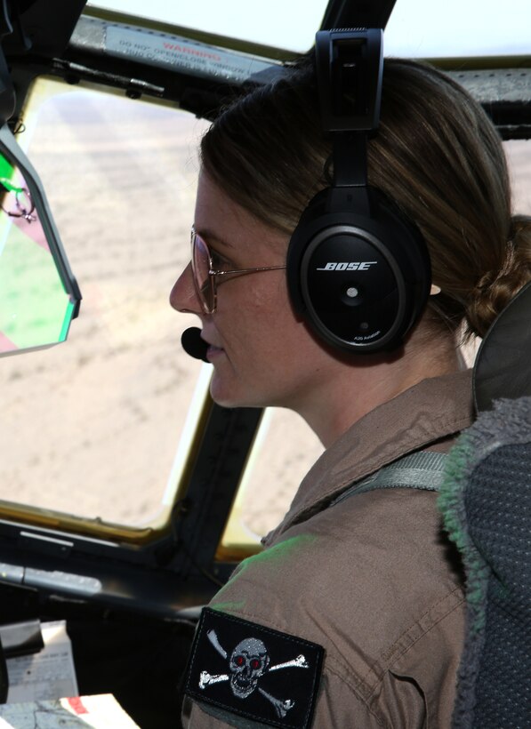 1st Lt. Alisa Sieber, co-pilot with Marine Aerial Refueler Transport Squadron (VMGR) 352 “Raiders,” flies a KC-130J Hercules during low-level tactical navigation training outside of Yuma, Ariz., July 24. This was Sieber’s first time flying low-level tactical navigation, earning her an initial qualification for the training. 