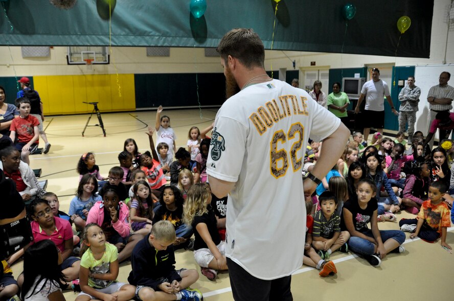 Sean Doolittle, Oakland A's pitcher, speaks to the children July 21 at the Travis Air Force Base Youth Center. Doolittle spoke about becoming a baseball player and answered questions for the children. (U.S. Air Force photo by Airman 1st Class Amber Carter)