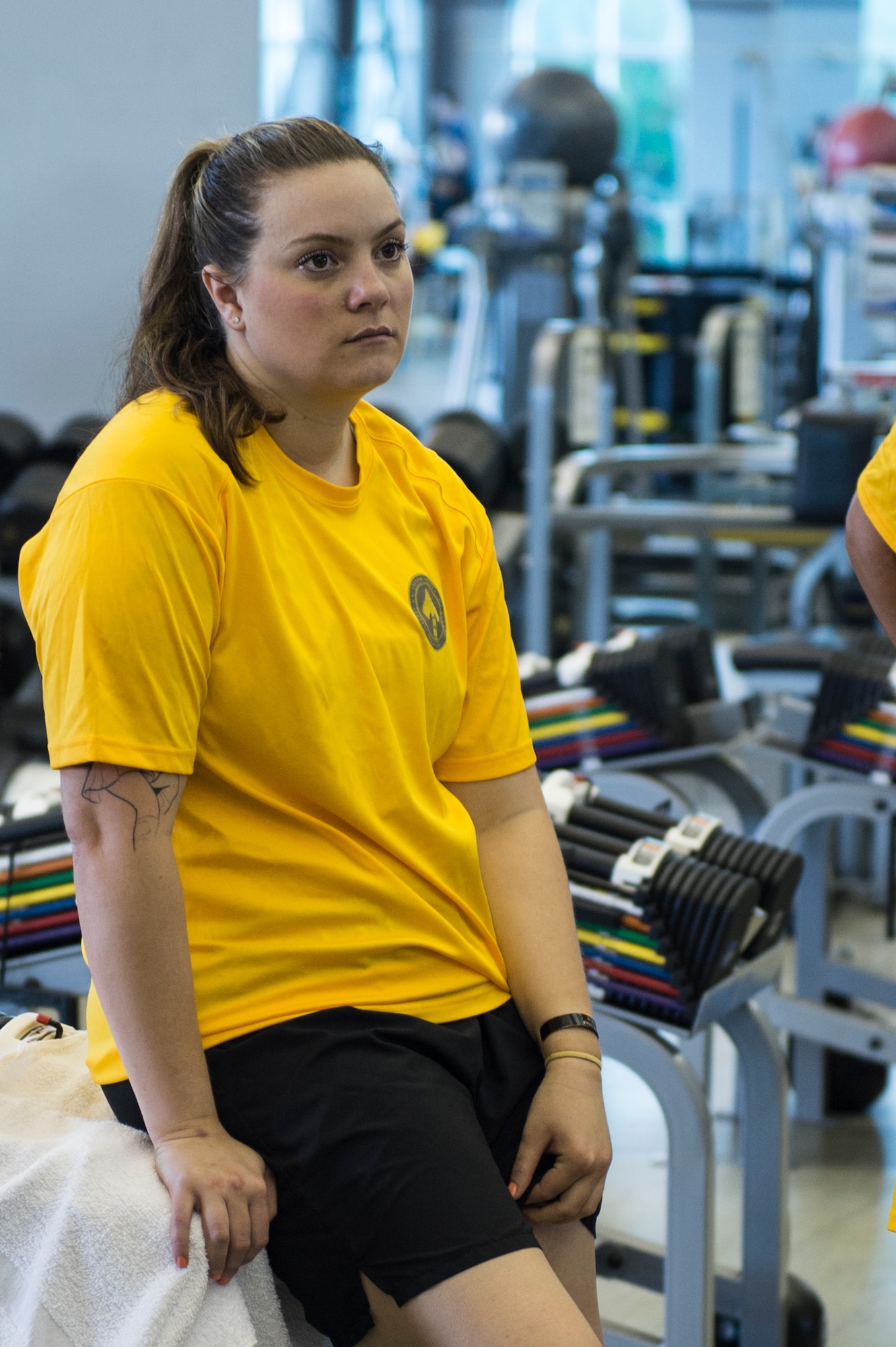 Staff Sgt. Erin McLoughlin, 4th Special Operations Squadron special missions aviator, listens to a brief at a training facility in Gulf Breeze, Fla., July 24, 2014. McLoughlin is one of 40 Wounded Warriors representing the U.S. Special Operations Command team at the 2014 Warrior Games. (U.S. Air Force photo/Airman 1st Class Jeff Parkinson)