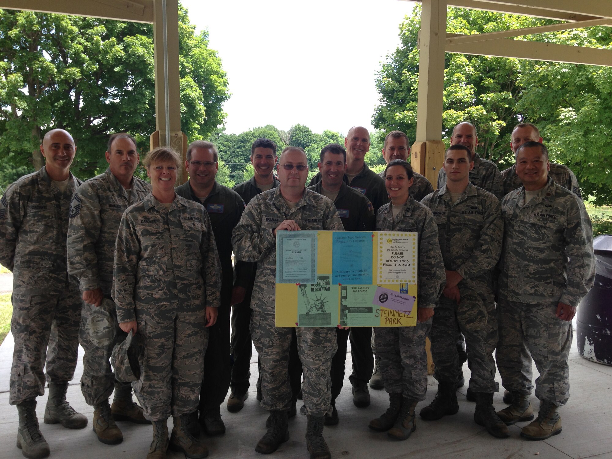 About 30 Airmen with the 109th Airlift Wing volunteered throughout the week to serve free lunches to youth in Schenectady, New York, July 20-25, 2014. The Schenectady Inner City Ministry has been providing free lunches to Schenectady's youth for 20 years. (Courtesy photo/Released)