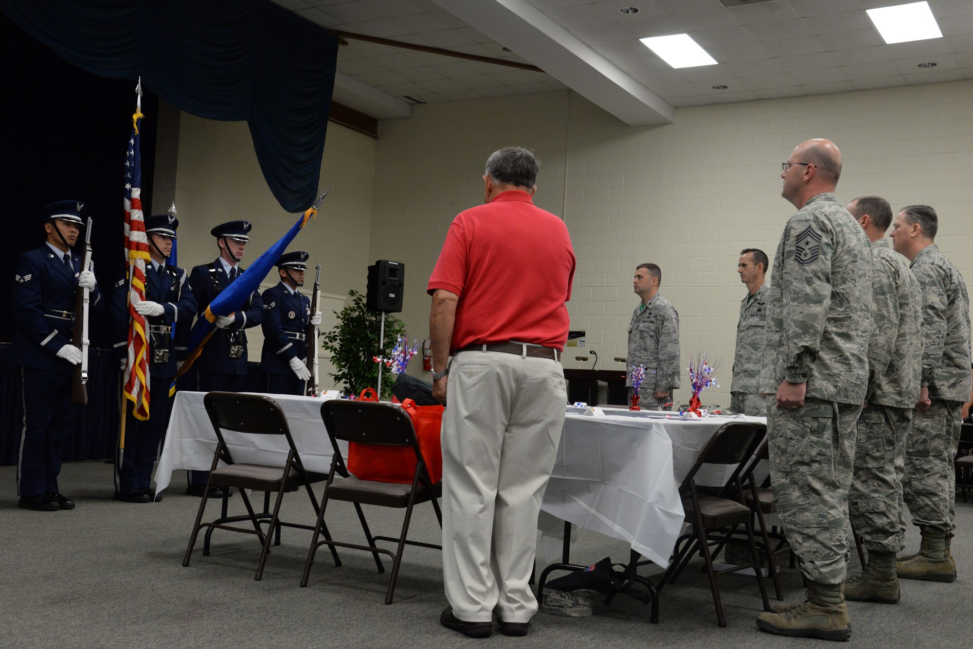 The Shaw Air Force Base Honor Guard presents the colors at the Ability One employee appreciation picnic at Shaw Air Force Base, S.C., July 25, 2014. The guest speaker of the event was Brig. Gen. Casey Blake, Office of the Assistant Secretary of the Air Force for Acquisition deputy assistant secretary for contracting. (U.S. Air Force photo by Airman 1st Class Jonathan Bass/Released)