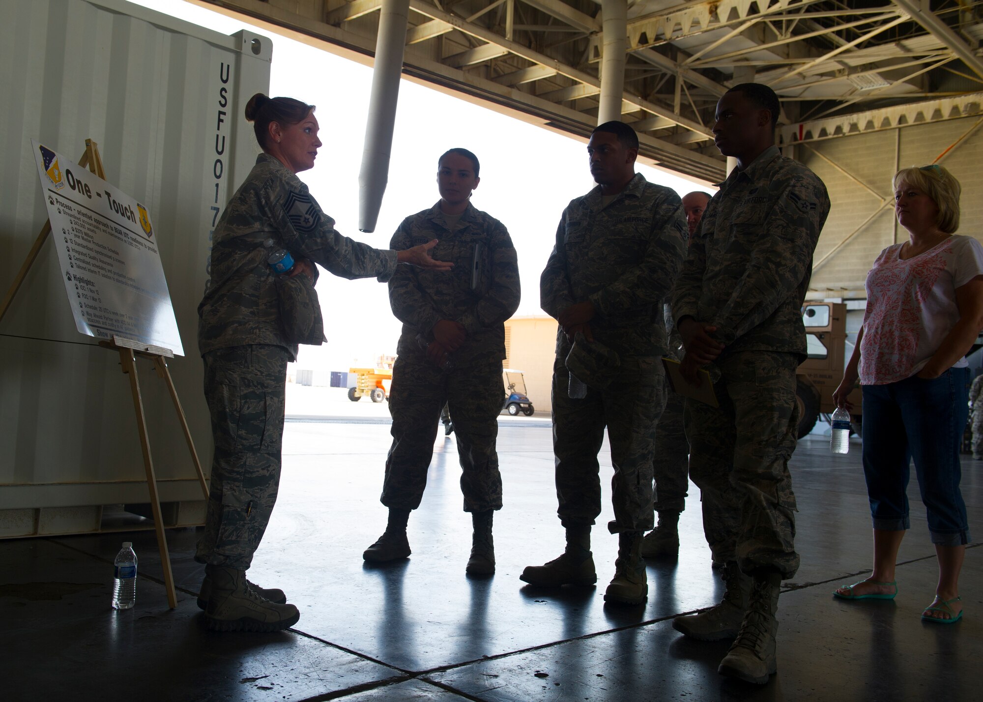 Chief Master Sgt. Wendy Rowe, 49th Material Maintenance Group superintendent explains the capabilities of the MMG during a tour at Holloman Air Force Base, N.M., July 24. The members toured Holloman’s Basic Expeditionary Airfield Resources Base unit to observe and learn about the Airmen and their mission. (U.S. Air Force photo by Airman 1st Class Leah Ferrante/Released)