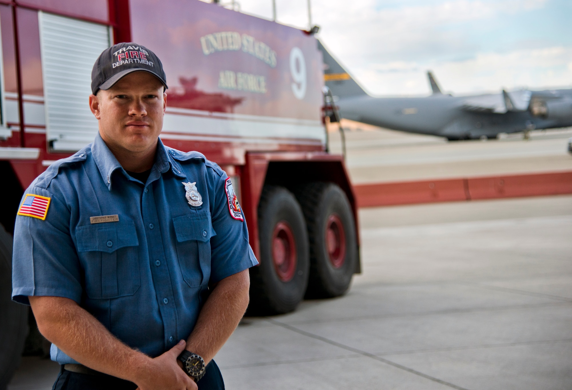 Chris Muriset, 60th Civil Engineer Squadron Fire Department engineer, stands on the flightline side of Fire Station 1, July 22 on Travis Air Force Base. Muriset recently used his fire training and experience to save a woman in an apartment building in San Leandro, California during his off time. (U.S. Air Force photo/Senior Airman Madelyn Brown)