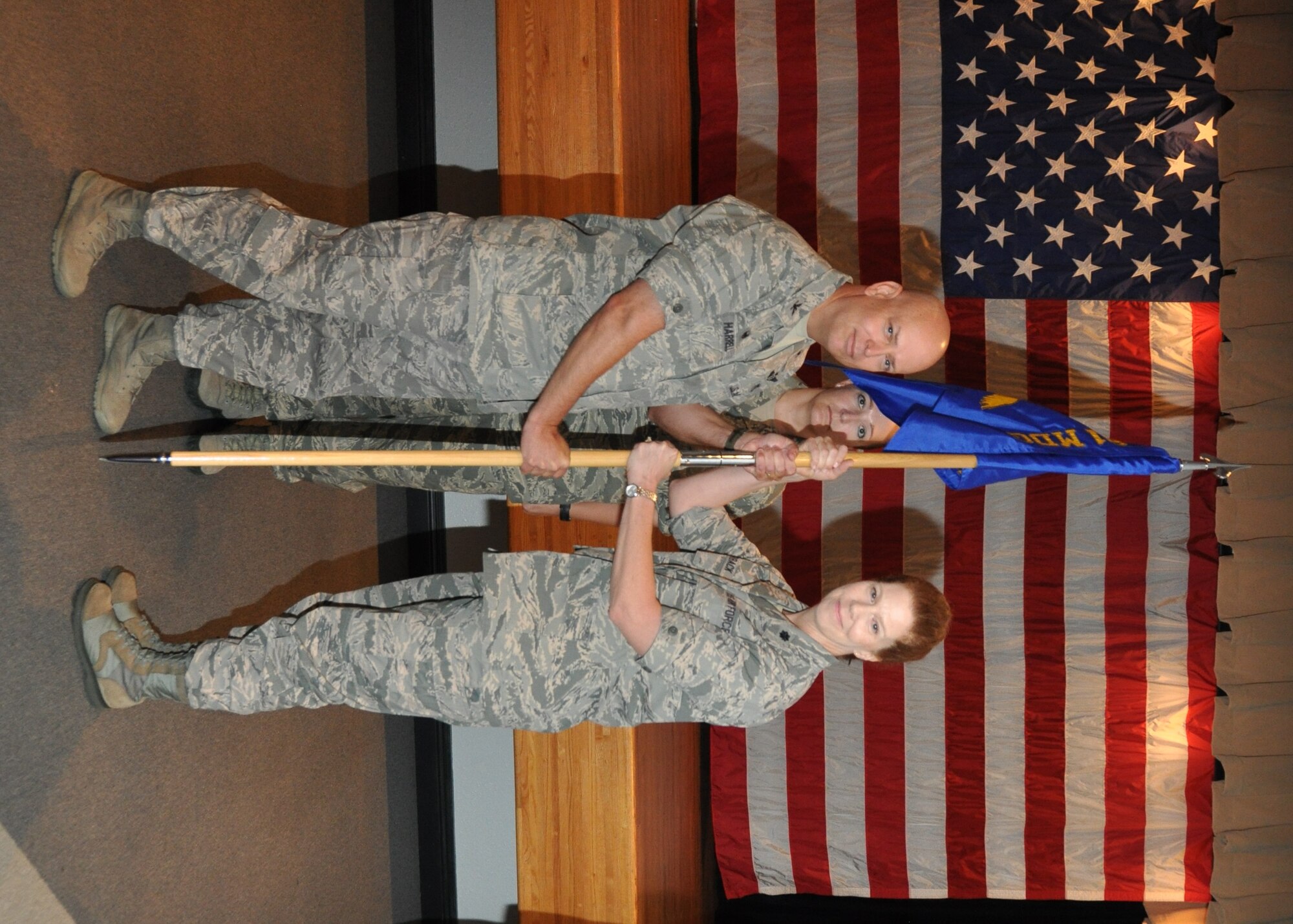 Col. Cherri’ Shireman accepts command of the 81st Medical Operations Squadron from acting commander Lt. Col. (Dr.) Nicholas Conger during a change of command ceremony at 9 a.m. June 27 in front of Keesler Medical Center.  Col. (Dr.) Tom Harrell, 81st Medical Group commander officiated the ceremony.  Guevara will be the chief nurse of the 48th MDG at Royal Air Force Lakenheath, United Kingdom. (U.S. Air Force photo by Steve Pivnick)