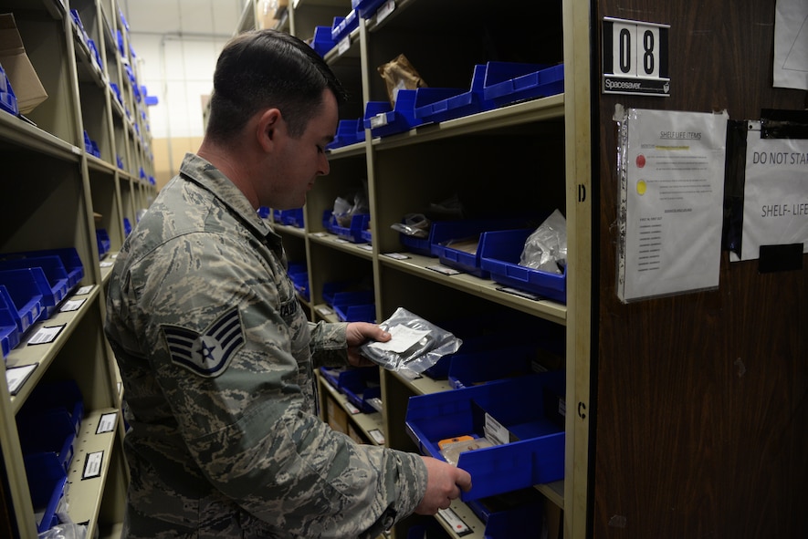 U.S. Air Force Staff Sgt. Nathan Tabor, 23d Logistics Readiness Squadron aircraft store supervisor, searches for an A-10C Thunderbolt II part, July 24, 2014 at Moody Air Force Base, Ga. The parts store provides all A-10 components except life support and hazardous equipment. (U.S. Air Force photo by Airman 1st Class Sandra Marrero/Released)
