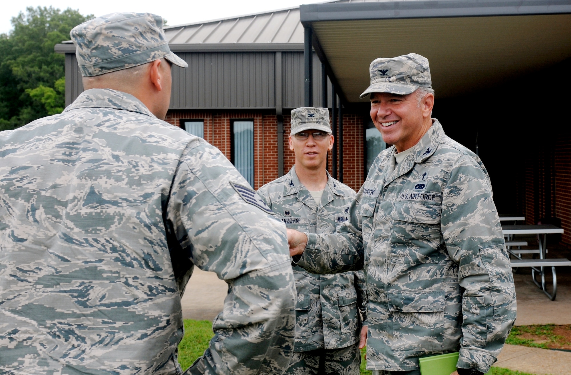 Col. Steve Schaick, Command Chaplain Air Education and Training Command, right, is joined by Col. Scott Vaughn, 14th Mission Support Group Commander, while he tours Columbus Air Force Base 14th Security Forces Squadron with chapel personnel, July 22. Schaick spoke with several personnel about the spiritual and morale needs of the base. (U.S. Air Force photo/ Sharon Ybarra)