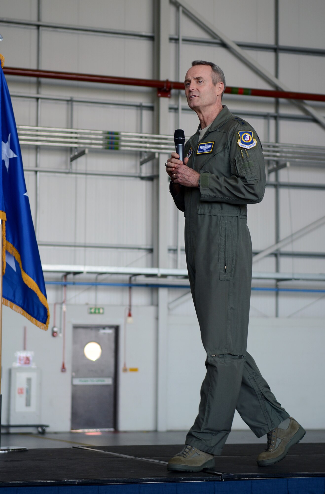 U.S. Air Force Lt. Gen. Darryl Roberson, 3rd Air Force commander, speaks to Team Mildenhall Airmen July 22, 2014, during an all call on RAF Mildenhall, England. Roberson held an all call to offer his thanks to the men and women of the 100th Air Refueling Wing. (U.S. Air Force photo/Airman 1st Class Kyla Gifford/Released)