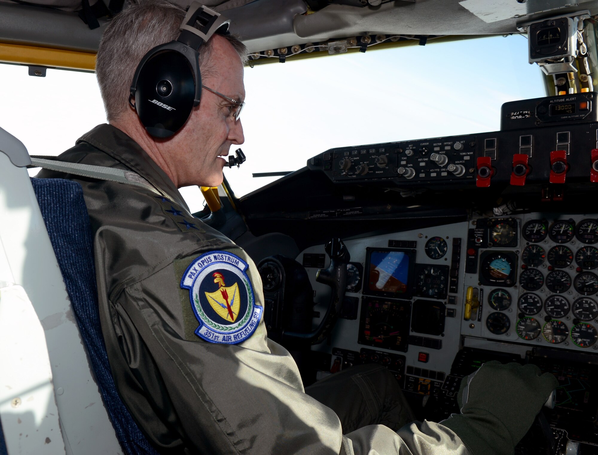 U.S. Air Force Lt. Gen. Darryl Roberson, 3rd Air Force commander, pilots a 100th Air Refueling Wing KC-135 Stratotanker for a training refueling mission July 22, 2014, during a visit to RAF Mildenhall, England. The 351st Air Refueling Squadron showed Roberson how they enable the global reach capabilities of the Air Force. (U.S. Air Force photo/Airman 1st Class Kyla Gifford/Released)