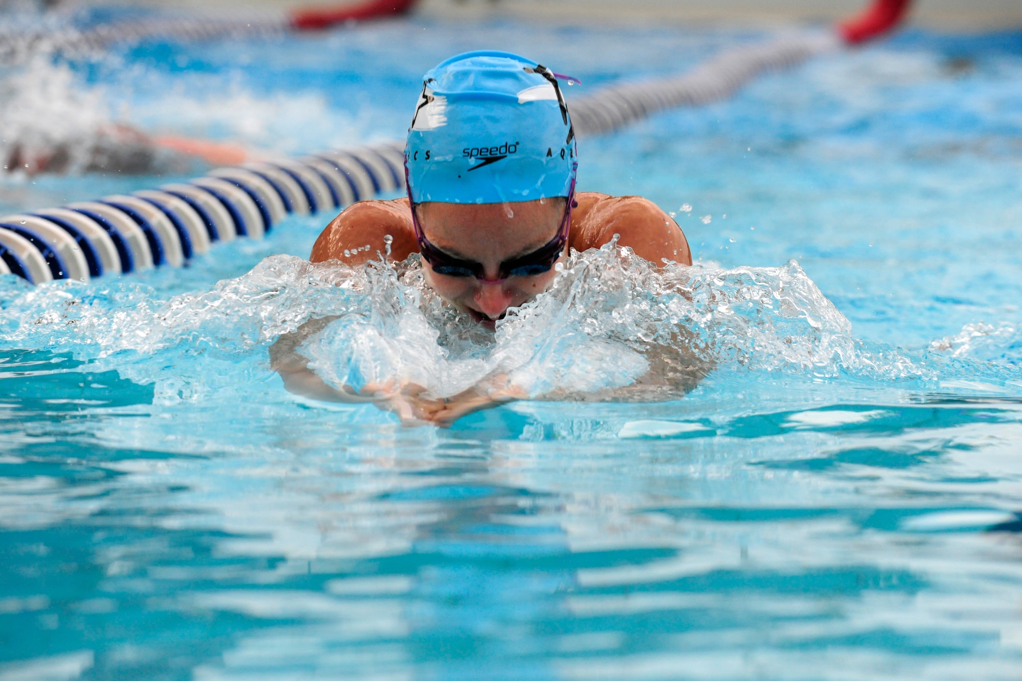 Ashley Walters, U.S. Master Swimming member, performs the breaststroke at practice, July 23, 2014, at Aviano Air Base, Italy. USMS is a national membership-operated nonprofit organization recently implemented here that gives adult swimmers an opportunity to swim in a controlled program with other adult swimmers. (U.S. Air Force photo/Airman 1st Class Ryan Conroy) 