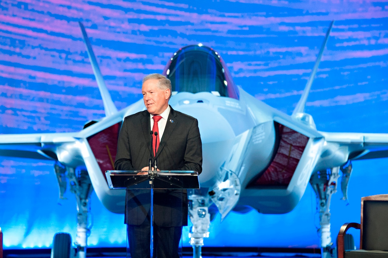 Frank Kendall, undersecretary of defense for acquisition, technology and logistics, speaks at a roll-out ceremony for the first two F-35 Lightning II joint strike fighter aircraft for the Royal Australian Air Force at Lockheed Martin in Fort Worth, Texas, July 24, 2014. Kendall said the aircraft represents an exponential leap in capability on the cutting edge of technology, and is an integral component of the ongoing U.S. and Australian commitment to stability in the Asia-Pacific region. Courtesy photo