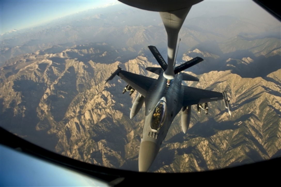 An F-16C Fighting Falcon receives fuel from a KC-135 Stratotanker during a mission over Afghanistan, July 22, 2014. The F-16 Fighting Falcon is a highly maneuverable aircraft that has proven itself in air-to-air combat and air-to-surface attack. 