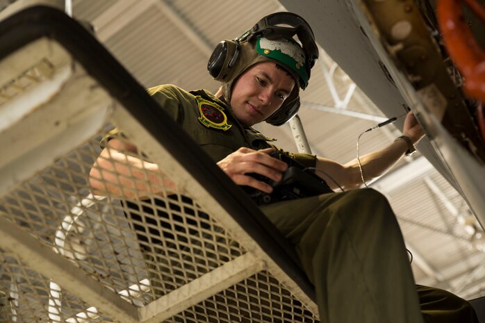 Cpl. Christopher Molden, a non-destructive inspection technician with Marine Aviation Logistics Squadron 12, conducts an eddy-current inspection on an F/A-18C Hornet aboard Marine Corps Base Hawaii July 21, 2014. Marine Aviation Logistics Squadron 12 is in Hawaii supporting Marine Fighter Attack Squadron 122 during Rim of the Pacfic Exercise 2014. Rim of the Pacific is a multinational maritime exercise that provides a unique training opportunity which helps participants foster and sustain cooperative relationships that are critical to ensuring the safety of the sea lanes and security of the world’s oceans.