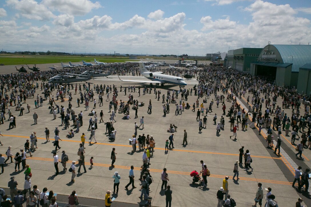 More than 20,000 people attended the 28th Sapporo Airshow July 20 at the Sapporo Okadama Airport. The airshow was the first to display the MV-22B Osprey tiltrotor aircraft for the public in Sapporo. The Ospreys gave the Japanese community a closer look at the aircraft. The Ospreys are with Medium Tiltrotor Squadron 262, Marine Aircraft Group 36, 1st Marine Aircraft Wing, III Marine Expeditionary Force. (U.S. Marine Corps Photo by Lance Cpl. Thor J. Larson/ Released)