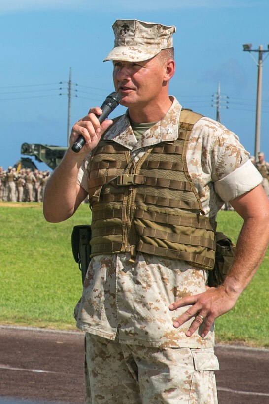 Brig. Gen. (select) Tracy W. King addresses Marines, sailors and civilians with 3rd Marine Logistics Group, III Marine Expeditionary Force, July 18 at Roberts Field during a change of command ceremony on Camp Kinser. The event marked the end of Brig. Gen. Niel E. Nelson’s two-year rotation as commanding general of 3rd Marine Logistics Group. King takes command of 3rd MLG following his command of Combat Logistics Regiment 15, 1st MLG, I MEF. Nelson is a Genoa, Nevada, native, and King is an Oklahoma City, Oklahoma, native. “I’m extremely proud to be able to take charge of this MLG,” said King. “They’ve been doing great things out here.” (U.S. Marine Corps photo by Lance Cpl. Pete Sanders/Released)

