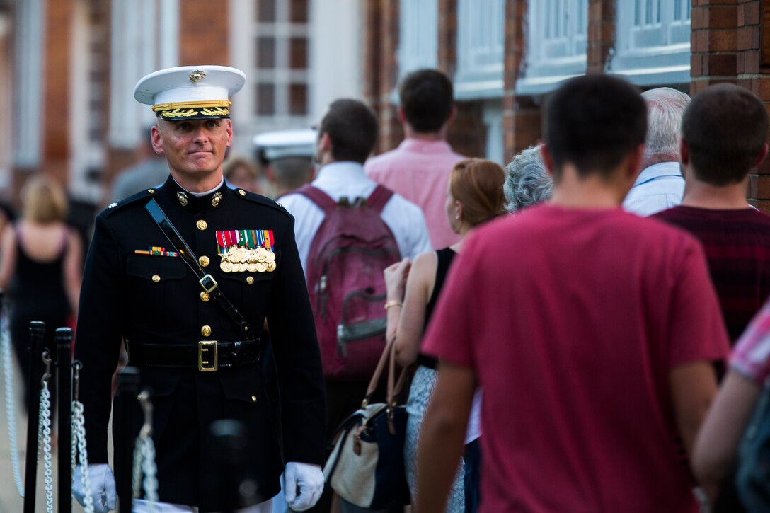 Lt. Col. Justin Dunne, Marine Barracks Washington, D.C. executive officer, travels down Officer's Walk prior to the start of a Friday Evening Parade at the Barracks, July 25, 2014. (Official Marine Corps photo by Cpl. Dan Hosack/Released)
