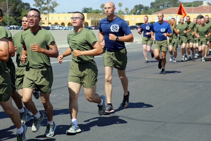 Pvt. Jose A. Caban (center) Platoon 3203, India Company, 3rd Recruit Training Battalion, runs with his platoon during this week’s Family Day Motivation Run at Marine
Corps Recruit Depot San Diego, July 24. Caban, 20, is from Bridgeport, Conn., After graduation he will continue his training at Marine Combat Training at Marine Corps
Base Camp Pendleton, Calif., and then to his military occupational specialty school. He was recruited out of Recruiting Substation Visalia, Calif.