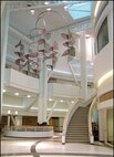 The Bassett Army Hospital facility manager spent $125,000 to install reels for accessing the ballasts in the lobby for future servicing of the lights, which are approximately 92 feet from the ground level. If reels had been designed in the conceptual phase and installed during construction, the cost would have been an estimated $25,000 - a savings of $100,000.