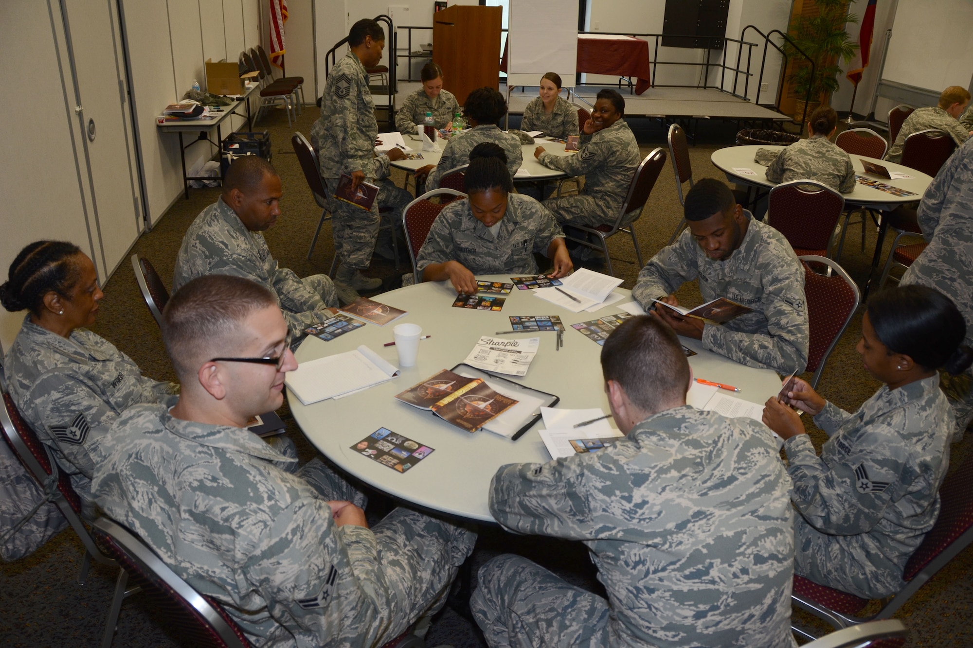 U.S. Airmen, assigned to the 169th Fighter Wing, attend a Four Lenses personality-type indicator assessment, during annual training at the Combat Readiness Training Center in Savannah, Ga., July 16, 2014.  This training experience has allowed Airmen to meet their annual requirements outside of the unit training assembly weekend throughout the year.  (U.S. Air National Guard photo by Tech. Sgt. Jorge Intriago/Released)