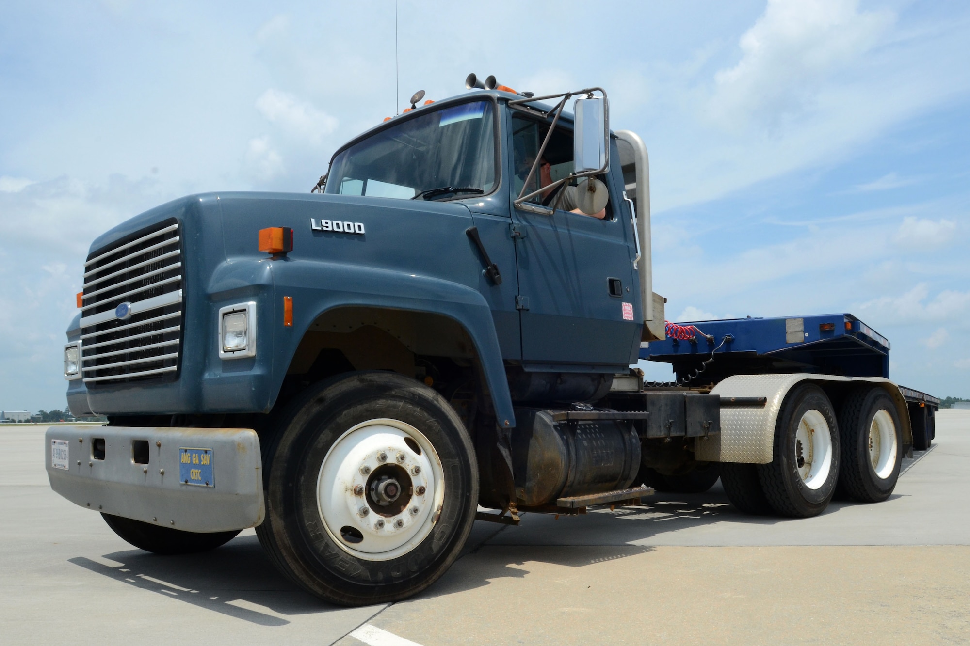 U.S. Air Force Airmen, assigned to the 169th Logistics Readiness Squadron at McEntire Joint National Guard Base, S.C., receive training on a Springfield 10 ton tractor trailer during annual training at the Combat Readiness Training Center in Savannah, Ga., July 16, 2014.  This training experience has allowed Airmen to meet their annual requirements outside of the unit training assembly weekend throughout the year.   (U.S. Air National Guard photo by Airman 1st Class Ashleigh S. Pavelek/Released)