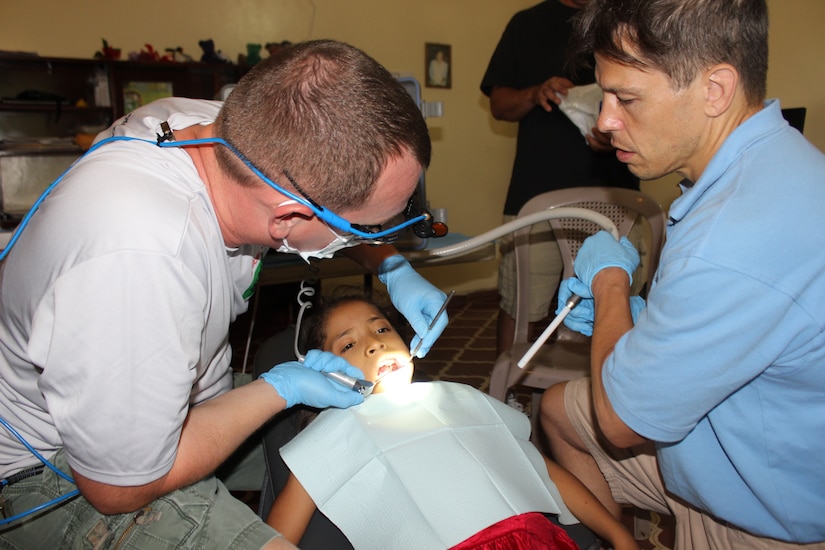 Joint Task Force-Bravo’s Medical Element (MEDEL) provide dental care for the Hogar de Niños Nazareth, a girls orphanage, July 20, 2014. The girls receive much needed preventative dental healthcare such as oral hygiene instructions, sealants, and fluoride treatments with supplies bought and donated by MEDEL service members.  (Photo by U. S. Army Sgt. Catherine Tharpe)