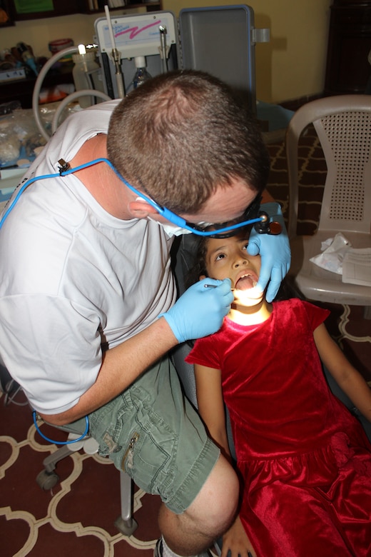 Joint Task Force-Bravo’s Medical Element (MEDEL) provide dental care for the Hogar de Niños Nazareth, a girls orphanage, July 20, 2014. The girls receive much needed preventative dental healthcare such as oral hygiene instructions, sealants, and fluoride treatments with supplies bought and donated by MEDEL service members.  (Photo by U. S. Army Sgt. Catherine Tharpe)