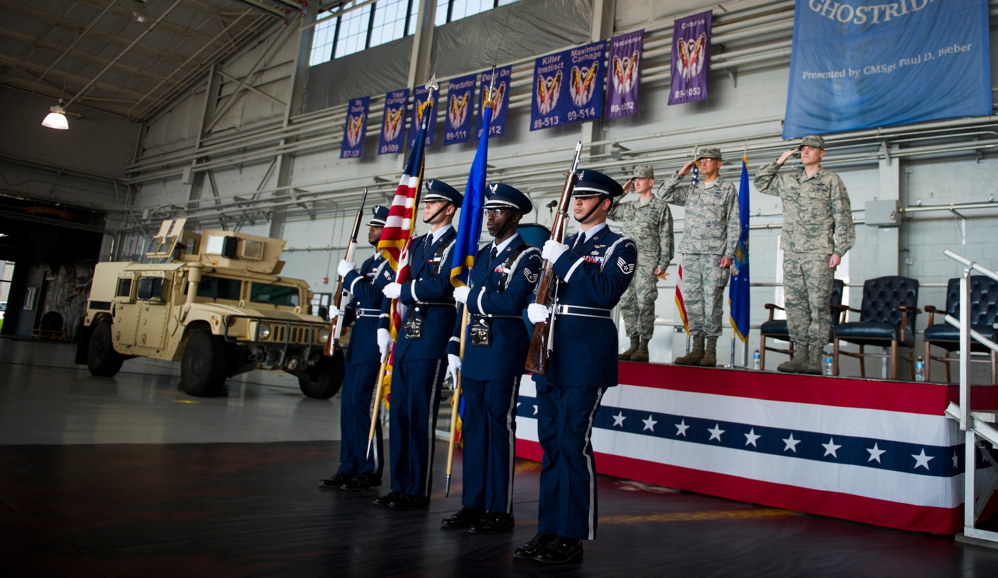 Hurlburt Field Honor Guard members post the colors during the 1st Special Operations Mission Support Group change of command ceremony at the Commando Hangar on Hurlburt Field, Fla., July 28, 2014. Col. Todd Fogle assumed command from Col. Douglas Dudley. (U.S. Air Force photo/Senior Airman Christopher Callaway)