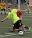 John Krafchuk, Hurlburt Field Intramural Soccer Tournament Semifinals left forward, attempts to dribble the ball past an 823rd RED HORSE team member during the Hurlburt Field Intramural Soccer Tournament Semifinals at the Aderholt Fitness Center on Hurlburt Field, Fla., July 25, 2014. More than 10 teams competed in the tournament. (U.S. Air Force photo/Senior Airman Kentavist P. Brackin) 