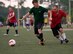 Christopher Mast, Hurlburt Field Intramural Soccer Tournament Semifinals forward, and Cameron Meehan, 823rd RED HORSE midfielder, run for control of the ball during the Hurlburt Field Intramural Soccer Tournament Semifinals at the Aderholt Fitness Center on Hurlburt Field, Fla., July 25, 2014. The maintenance team defeated RED HORSE, 2-1, during the semifinals. (U.S. Air Force photo/Senior Airman Kentavist P. Brackin)