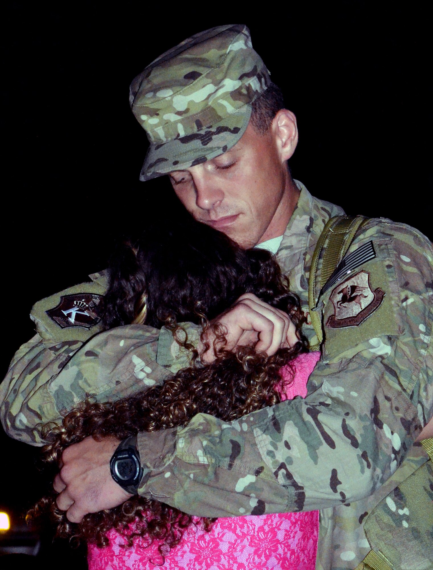 Members of the 920th Rescue Wing Maintenance Squadron prepare to deploy on July 23, 2014 at Patrick Air Force Base, Fla.  Airmen say goodbye to friends and family before departing on a C-5 Galaxy to aid the search and rescue mission in the horn of Africa region. The 920th RQW performs combat search and rescue as its primary mission, which includes rescuing downed pilots.  Additionally the 920th RQW is responsible for civil search and rescue, humanitarian relief and support of rocket launches. To date, the unit has saved more than 3,000 lives, both in peacetime and combat. (U.S. Air Force photo /Staff Sgt. Sarah Pullen)
