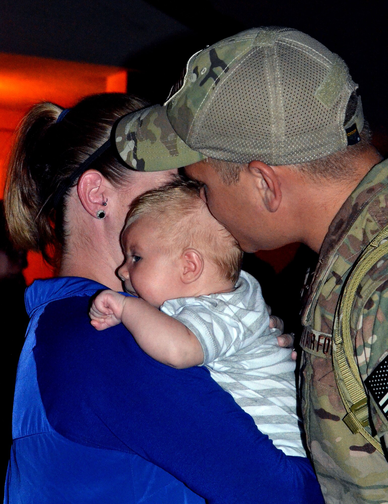 Members of the 920th Rescue Wing Maintenance Squadron prepare to deploy on July 23, 2014 at Patrick Air Force Base, Fla.  Airmen say goodbye to friends and family before departing on a C-5 Galaxy to aid the search and rescue mission in the horn of Africa region. The 920th RQW performs combat search and rescue as its primary mission, which includes rescuing downed pilots.  Additionally the 920th RQW is responsible for civil search and rescue, humanitarian relief and support of rocket launches. To date, the unit has saved more than 3,000 lives, both in peacetime and combat. (U.S. Air Force photo /Staff Sgt. Sarah Pullen)