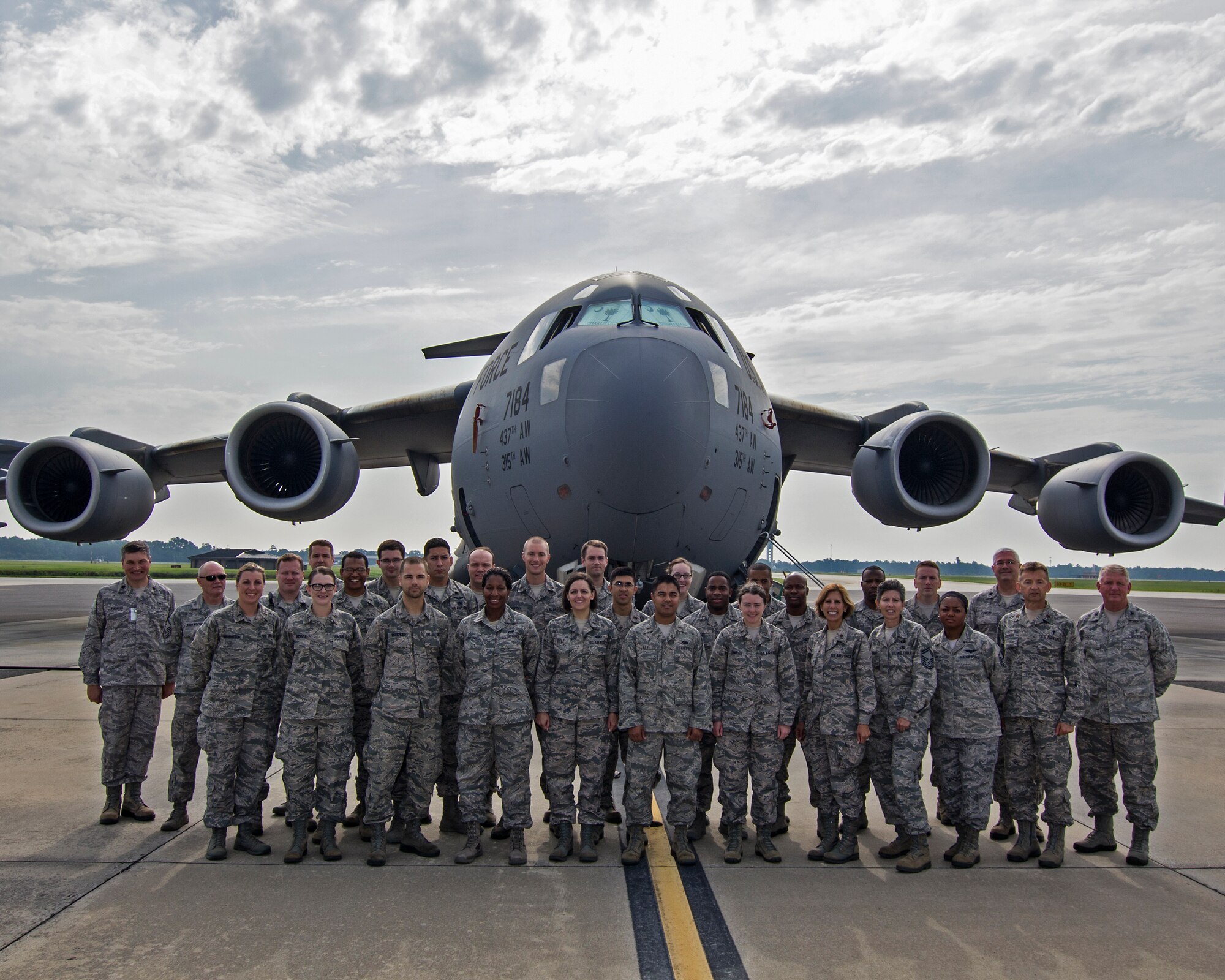 Air Force Chaplain Candidates and their cadre, who were visiting Joint Base Charleston, South Carolina pose for a group photo in front of a C-17 Globemaster III. The Air Force Chaplain Candidate Program allows seminary and other professional religious school students to evaluate their compatibility and potential for commissioning as an Air Force Chaplain. The focus  of the chaplain candidate program is on experiencing ministry in the Air Force during a summer tour of active duty. Upon entering the program, individuals are commissioned as a chaplain candidate, in the grade of Second Lieutenant. After graduation and obtaining an ecclesiastical endorsement, candidates are then eligible for reappointment as a chaplain in either, the U.S. Air Force Reserve, the Air National Guard or placed on active duty. (U.S. Air Force photo / Michael Dukes)