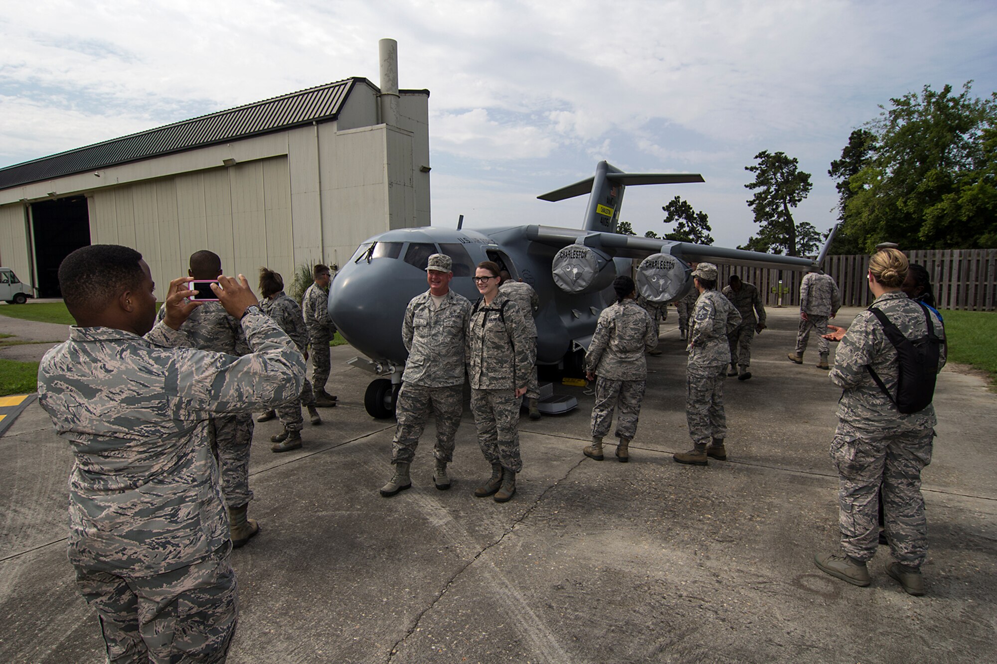 Air Force Chaplain Candidates who were visiting Joint Base Charleston, South Carolina take photos in front of the 315th Airlift Wing's mini C-17 Globemaster after touring the real C-17 moments earlier. The Air Force Chaplain Candidate Program allows seminary and other professional religious school students to evaluate their compatibility and potential for commissioning as an Air Force Chaplain. The focus  of the chaplain candidate program is on experiencing ministry in the Air Force during a summer tour of active duty. Upon entering the program, individuals are commissioned as a chaplain candidate, in the grade of Second Lieutenant. After graduation and obtaining an ecclesiastical endorsement, candidates are then eligible for reappointment as a chaplain in either, the U.S. Air Force Reserve, the Air National Guard or placed on active duty. (U.S. Air Force photo / Michael Dukes)