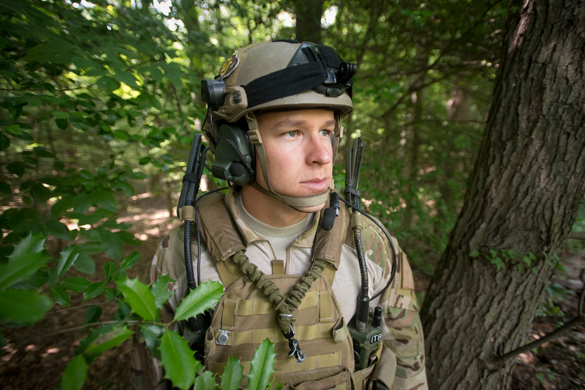 Technical Sgt. Douglas Matthews, a combat controller assigned to the 125th Special tactics Squadron, Oregon Air National Guard, stands near a trail at Joint Base Andrews, Maryland June 17. Matthews was recently awarded the Silver Star, the nation's third-highest award for valor and is one of the 12 Outstanding Airmen of 2014. (Air National Guard Photo by Master Sgt. Marvin R. Preston/Released)