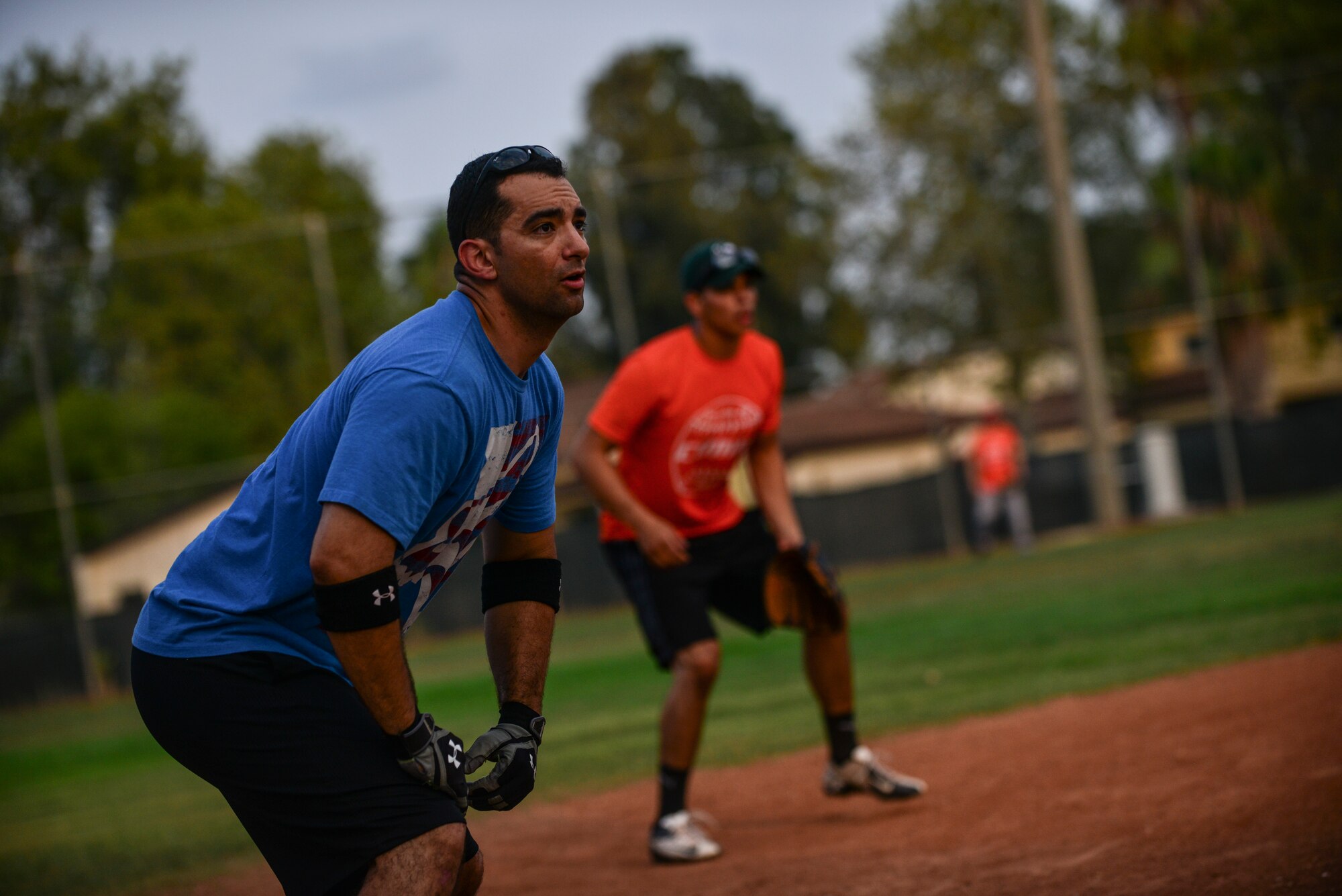 Albert Flores stands on third base during a softball game July 25, 2014, Incirlik Air Base, Turkey. The 39th Communications Squadron and the 39th Wing Staff Agencies intramural softball team played in the championship game, leaving the 39th WSA with a victory of  12-3. (U.S. Air Force photo by Senior Airman Nicole Sikorski/Released) 