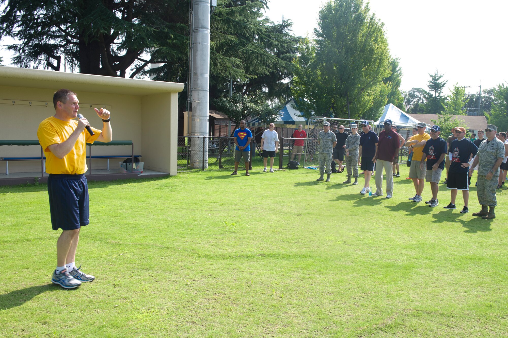 YOKOTA AIR BASE, Japan -- Col. Douglas DeLaMater, 374th Airlift Wing commander, speaks to members of Team Yokota during Airman Appreciation Day at Yokota Air Base, Japan, July 25, 2014. DeLaMater hosted the day to represent the appreciation he and other commanders on base have for the work Airmen conduct everyday. (U.S. Air Force photo by Airman 1st Class David D. Danford/Released)
