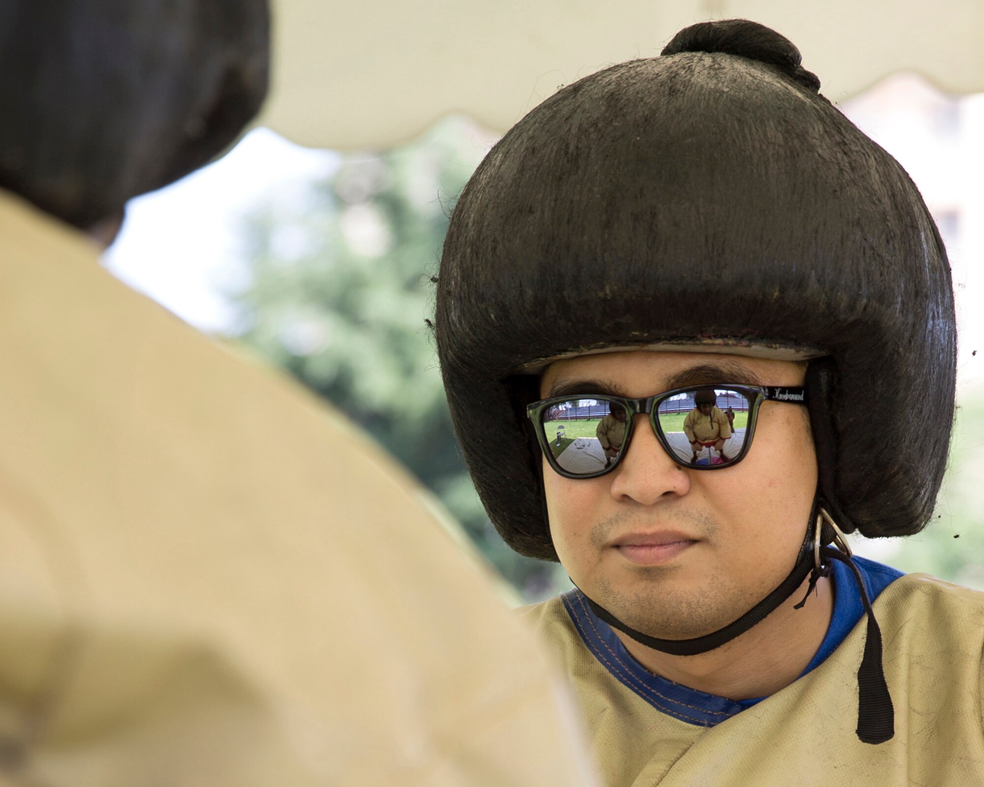 An Airman from the 374th Force Support Squadron gets ready to sumo fight during Airman Appreciation Day at Yokota Air Base, Japan, July 25, 2014. This is the third annual Airmen Appreciation Day. (U.S. Air Force photo by Osakabe Yasuo/Released)