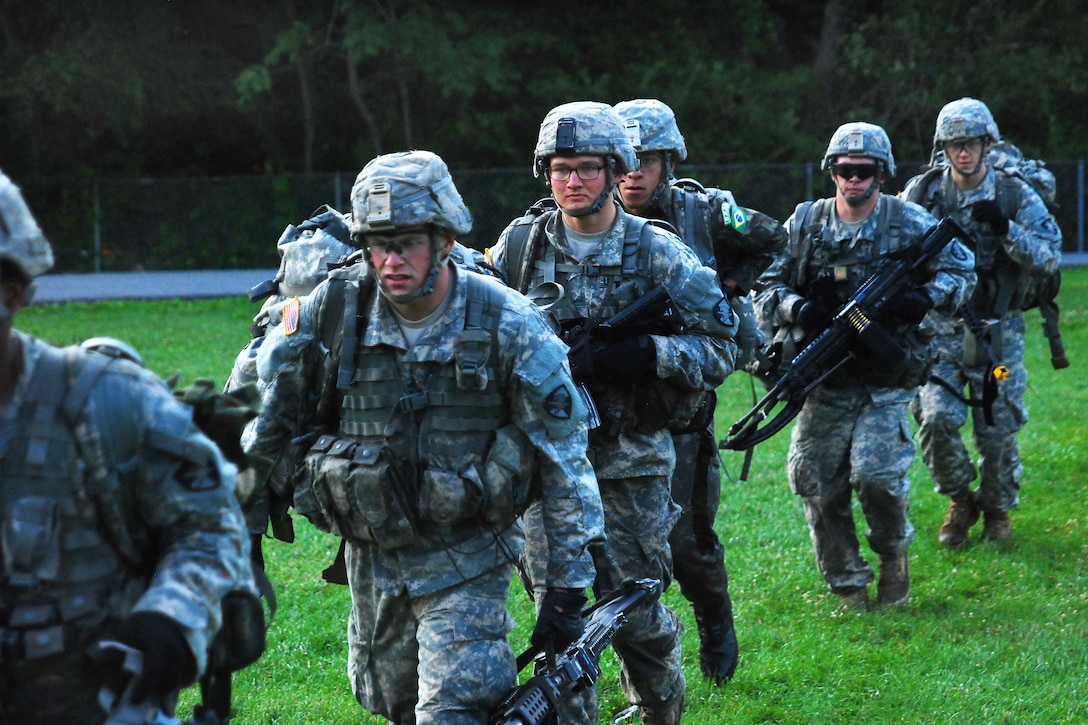 Cadets from the U.S. Military Academy in West Point, N.Y, board a UH-60M Black Hawk helicopter before conducting an air assault exercise during cadet summer training on Camp Buckner, N.Y., July 21, 2014.