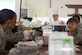 Certified Master Chef James Hanyzeski teaches a class on food preparation to Airmen from the 374th Force Support Squadron July 15, 2014, on Yokota Air Base, Japan. Hanyzeski's visit provided services Airmen with alternative healthier recipes as part of the Healthy Base Initiative. (U.S. Air Force photo/Airman 1st Class David Danford)
