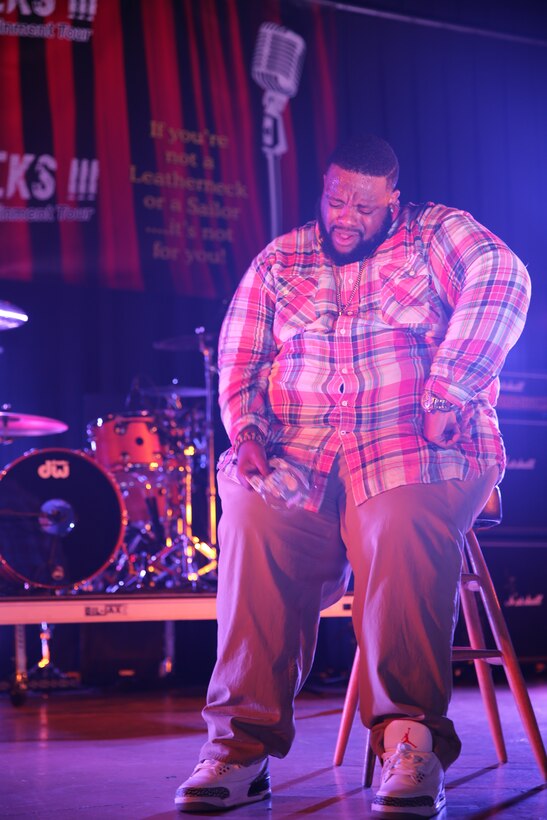 Comedian Ronnie Jordan performs a comedy piece about his love for a sticky honey bun during the For the Leathernecks III Comedy and Entertainment Tour at the Twin Rivers Theater at Marine Corps Air Station Cherry Point, July 25, 2014. The tour served as an opportunity for active duty service members to enjoy food, laughter and music.


