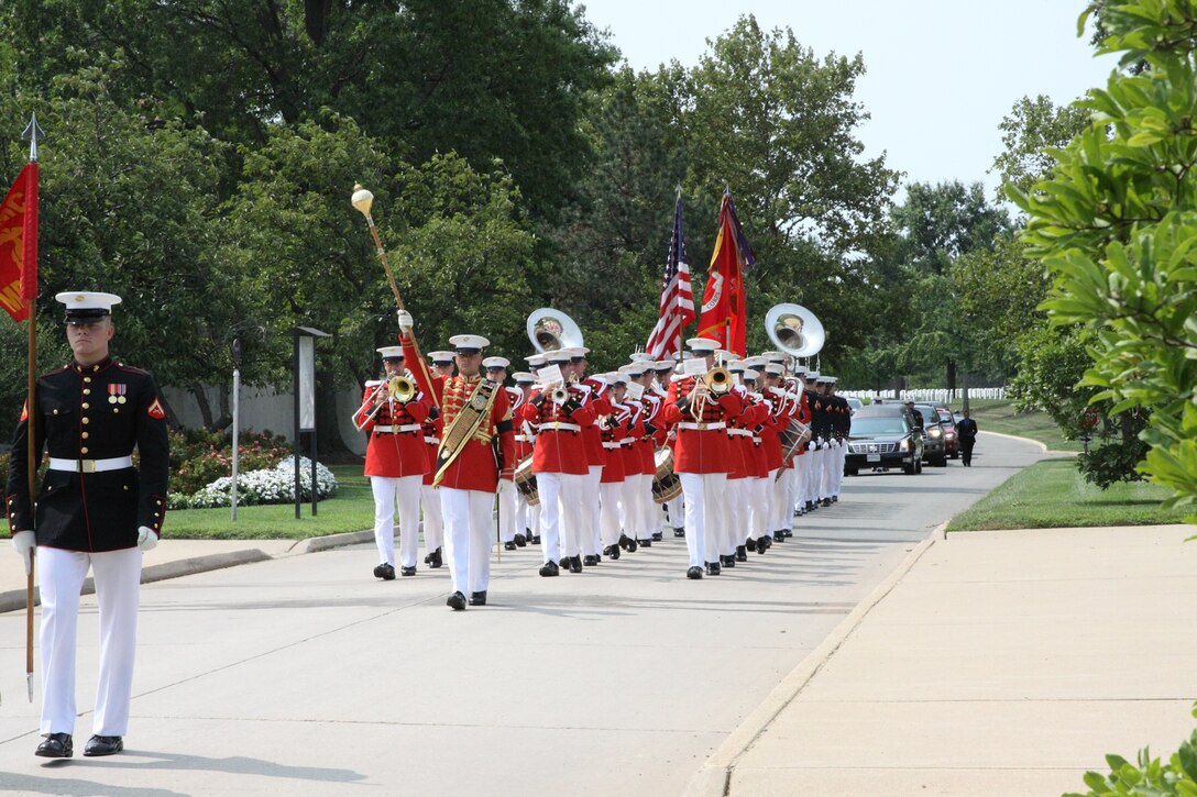 On July 29, 2014, the Marine Band, led by Assistant Drum Major Staff Sgt. Steven Williams, participated in the funeral for World War II casualty Pfc. Randolph Allen, USMC. Pfc. Allen was killed in action on Nov. 20, 1943 during the Battle of Tarawa in the central Pacific Ocean. From Nov. 12-27, 2013, History Flight, a private organization, excavated what was believed to be a wartime fighting posit...ion on the island of Betio. During this excavation History Flight recovered five sets of remains. The Joint POW/MIA Accounting Command used circumstantial evidence and forensic identification tools to identify Pfc. Allen. His remains were returned to the United States and buried at Arlington National Cemetery with full military honors. (U.S. Marine Corps photo by Master Sgt. Kristin duBois/released)