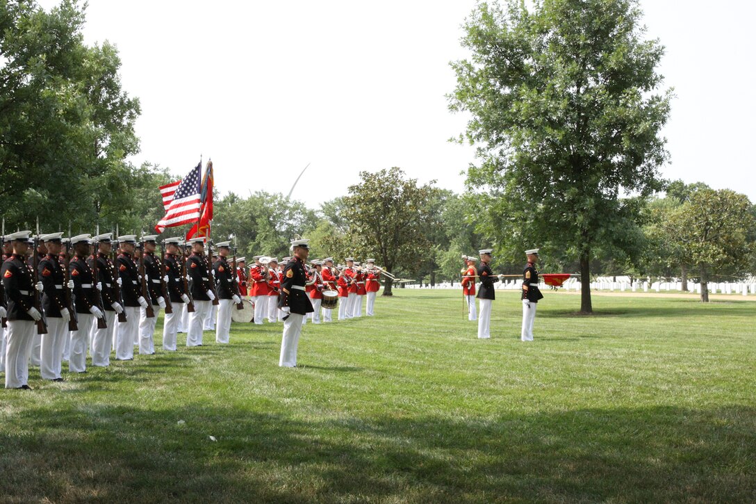 On July 29, 2014, the Marine Band, led by Assistant Drum Major Staff Sgt. Steven Williams, participated in the funeral for World War II casualty Pfc. Randolph Allen, USMC. Pfc. Allen was killed in action on Nov. 20, 1943 during the Battle of Tarawa in the central Pacific Ocean. From Nov. 12-27, 2013, History Flight, a private organization, excavated what was believed to be a wartime fighting posit...ion on the island of Betio. During this excavation History Flight recovered five sets of remains. The Joint POW/MIA Accounting Command used circumstantial evidence and forensic identification tools to identify Pfc. Allen. His remains were returned to the United States and buried at Arlington National Cemetery with full military honors. (U.S. Marine Corps photo by Master Sgt. Kristin duBois/released)