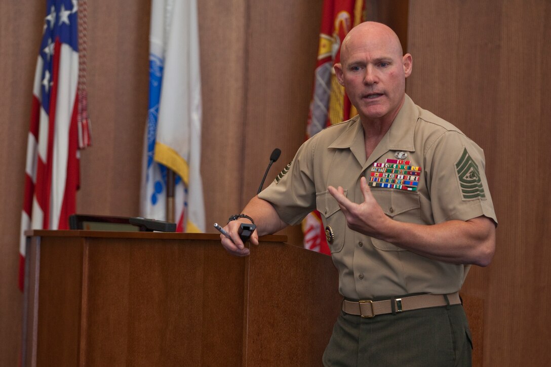 Sgt. Maj. Micheal P. Barrett, the 17th Sergeant Major of the Marine Corps, speaks to Marines at 1stSgt's Course at Quantico, Va., on July 29, 2014. (U.S. Marine Corps photo by Lance Cpl. Samantha K. Draughon/ Released)