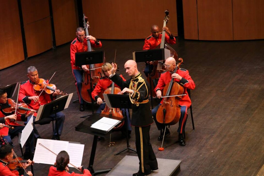 Marine Band Director Lt. Col. Jason K. Fettig conducted the Marine Chamber Orchestra on July 19, 2014 at the Rachel M. Schlesinger Concert Hall at Northern Virginia Community College in Alexandria. The program included Wolfgang Amadeus Mozart’s Adagio and Fugue in C minor, K. 546; Dmitri Shostakovich’s Chamber Symphony, Opus 110a; Jean Sibelius’s Impromptu for String Orchestra; and Mieczyslaw Karlowicz’s Serenade for String Orchestra, Opus 2. (U.S. Marine Corps photo by Master Sgt. Kristin duBois/released)